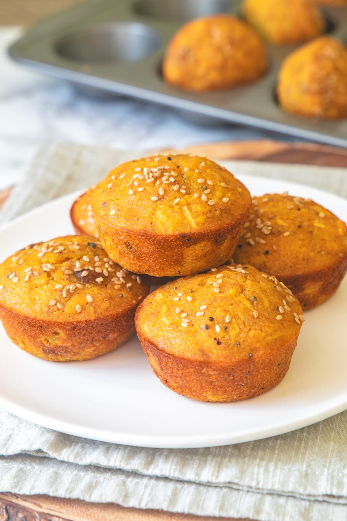 Handvo muffins in a plate.