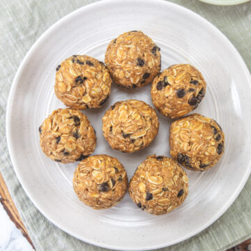 Peanut butter oatmeal balls in a plate with napkin under it.