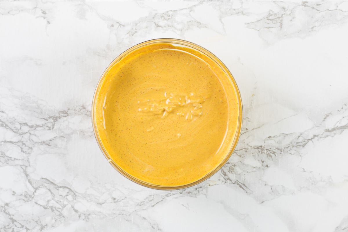 Taco Bell quesadilla sauce removed into a bowl.