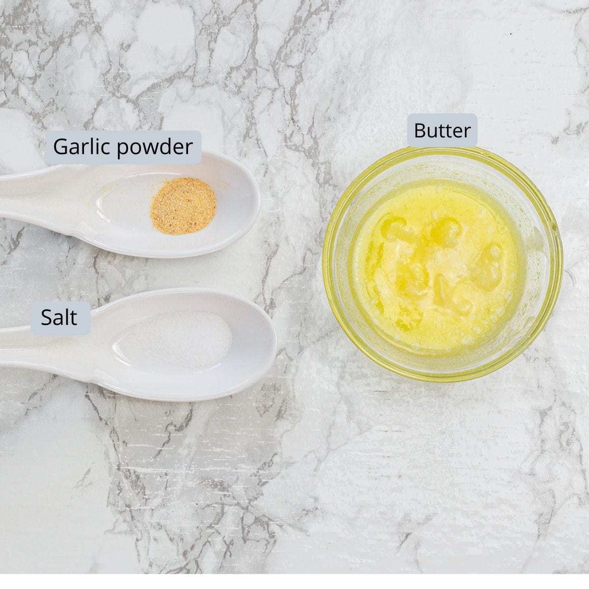 Garlic butter topping ingredients with labels.